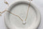 White gemstones jewelry - moonstone, pearl, opal, quartz