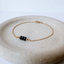 Black faceted bead bracelet on a delicate gold filled chain