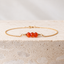 Dainty carnelian bracelet in 14k gold-filled on travertine