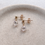 Sparkling clear cubic zirconia teardrop earrings on gold-filled ball studs