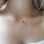 Delicate gold-filled chain with a smoky quartz teardrop worn as an everyday necklace