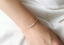 Delicate opal bracelet worn on the wrist