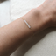 Opal beaded bar bracelet worn on the wrist