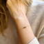 Dainty smoky quartz bracelet in 14k gold-filled worn on the wrist