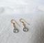 Gold-filled French earwire labradorite earrings on white linen