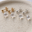 Gold-filled and sterling silver cubic zirconia drop stud earrings side by side