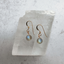 Labradorite drop earrings in 14k gold-filled on a selenite slab