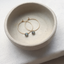 Labradorite hoop earrings in 14k gold-filled in a ceramic dish