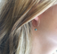 Labradorite hoop earring worn with golden hair
