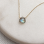 Dainty labradorite necklace in 14k gold-filled on marble
