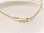 Opal bead necklace with three faceted Ethiopian opals on a 14k gold-filled chain