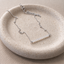 Sterling silver opal beaded bar necklace on a stone dish