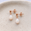 Rose gold filled opal teardrop stud earrings with butterfly backs