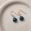 London blue topaz dangle earrings in 14k gold filled with faceted deep blue topaz heart briolettes on French ear wires