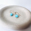 Dainty turquoise gemstone earrings with small blue teardrop stones and gold filled hooks