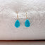 Turquoise teardrop dangle earrings with vibrant blue gemstones and delicate gold filled ear wires