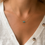 Turquoise three-bead necklace worn as an everyday December birthstone necklace