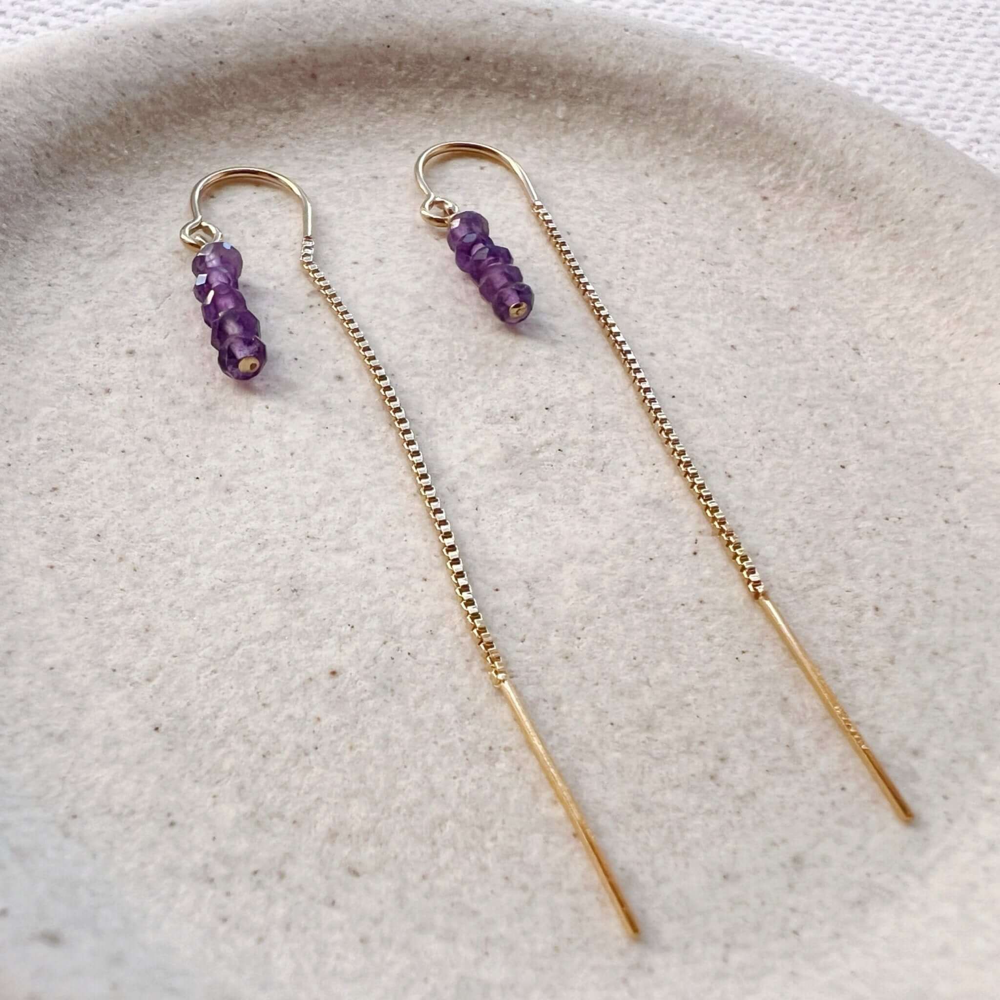 Beaded amethyst threader earrings with multiple amethyst beads on delicate gold filled chains