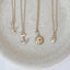 Dainty 14k gold filled charm necklace collection with starfish anchor sun and heart pendant options
