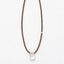 Close-up of 3mm faceted smoky quartz rondelle beads and freshwater pearl